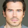 Josh Burdett as Captain Rice
