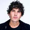Daniel Hallberg as Dark-Haired Advertising Agent