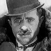 Billy Engle as Third Bank Teller (Uncredited)
