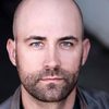 Aaron Marshall as Officer #1
