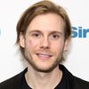 Zachary Booth as Theo Green