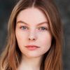 Nell Hudson as Ruth
