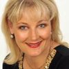 Louise Saint-Claire as Estate Agent