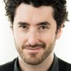 Andrew Barber as Garrett