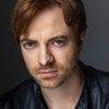 Matthan Harris as Mark Neville