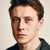 George MacKay as Ned Kelly