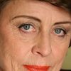 Sheena Larkin as Commission Lawyer