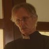 Daniel Steere as Father Stewart