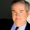 Timothy Davis-Reed as John Logan