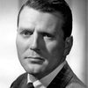 Charles McGraw as Strud Strudwick (uncredited)