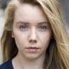 Lauren Lyle as Annie Stock