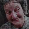 Edna MacAfee as Seller at Swapmeet