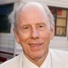 Rance Howard as Father Kelly