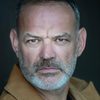 Alexander John as Priest