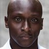 Michael Amariah as Robert