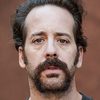 Rob Moore as Reggie Barry