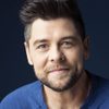 Jason Crabb as Pastor Tom Roberts