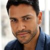 Sanjit De Silva as Suit #2 (Jonathan)
