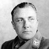 Martin Bormann as Self - Sits on Hitler's Left, at HJ Rally, Enters Hall Behind Hess, Sits Behind Streicher