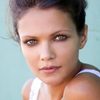 Anya Lahiri as Check-In Girl