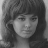 Sylvie Bréal as Martine, maid