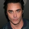 Vincent Young as Curly