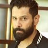 Vikram as Akhilan / Love