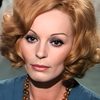 Franca Polesello as Monique Roussel
