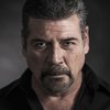 Guillermo Quintanilla as Delfino