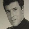 Nico Minardos as DeLeon