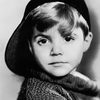 Scotty Beckett as Boy on Ship (uncredited)