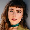Indigo Jackson as Cynthia Rose / Neanderthal Woman