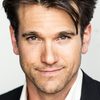 Adam Mayfield as Tom Campbell