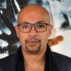 Kamel Laadaili as Momo