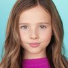 Finley Rose Slater as Zoey