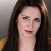 Sarah T. Cohen as Simone