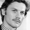 Helmut Berger as Konrad Huebel