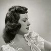 Becky Brown as Genevieve Calvin