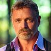John Schneider as Buck