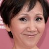 Lu Yi-ching as Hsiao-kang's Mother