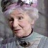 Nora Nicholson as Mrs. Frith