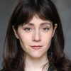 Carly-Sophia Davies as Receptionist
