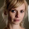 Anna Tenta as Xenia, l'Allemande