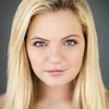 Kyla Deaver as April