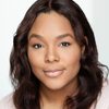 Briauna James as Immigration Agent