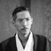 Reikô Tani as Tomio's Father