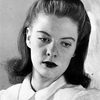 Mary Nell Santacroce as Secretary