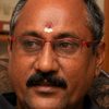 Nadodigal Gopal as Selvi's Step Father