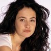 Susannah Doyle as Maggie Lemass (archive footage)