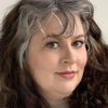 Suzanne Smith as Roland's Assistant